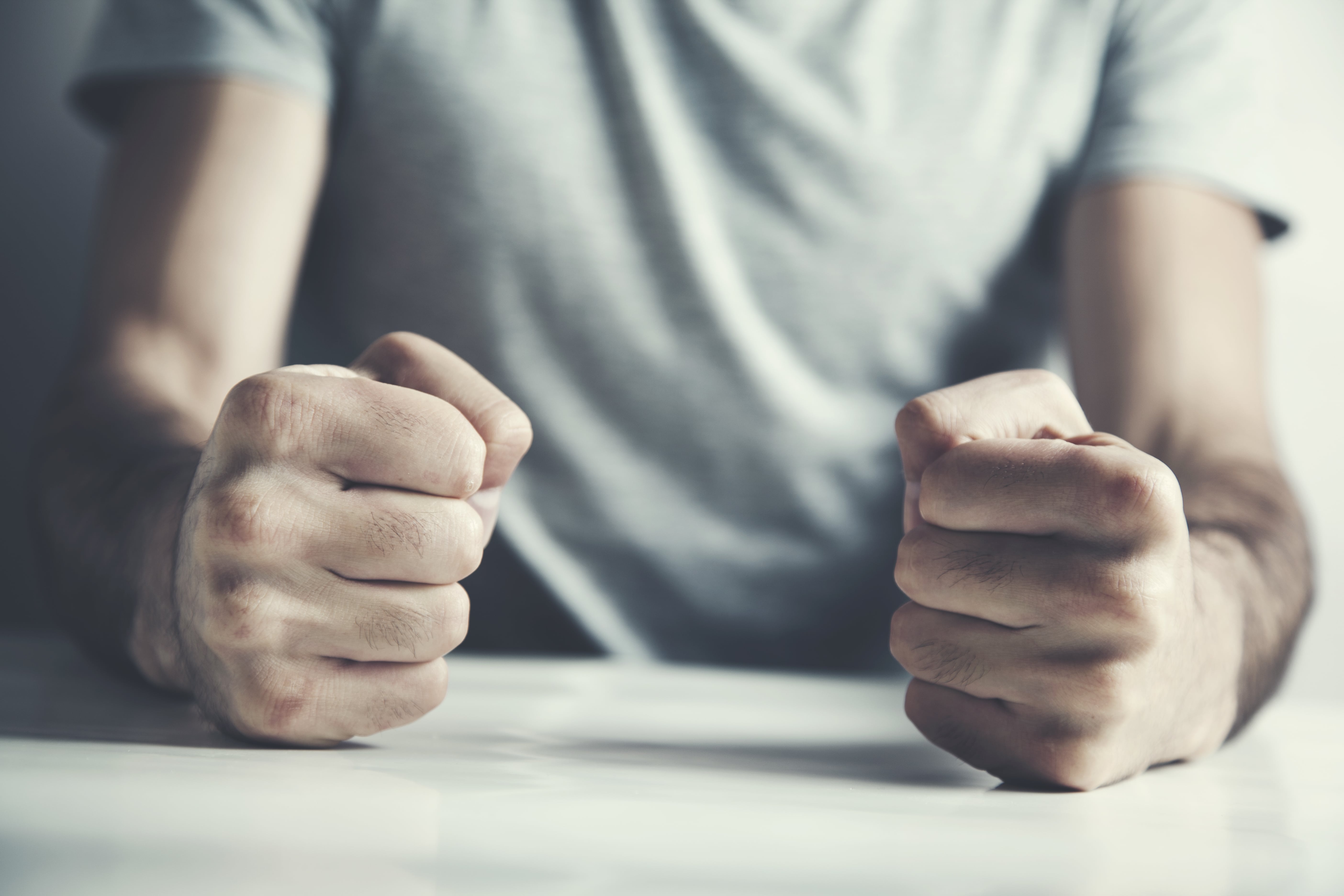 man making fists